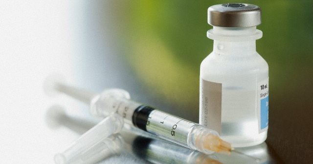 Closeup of needle with single-use vaccine.