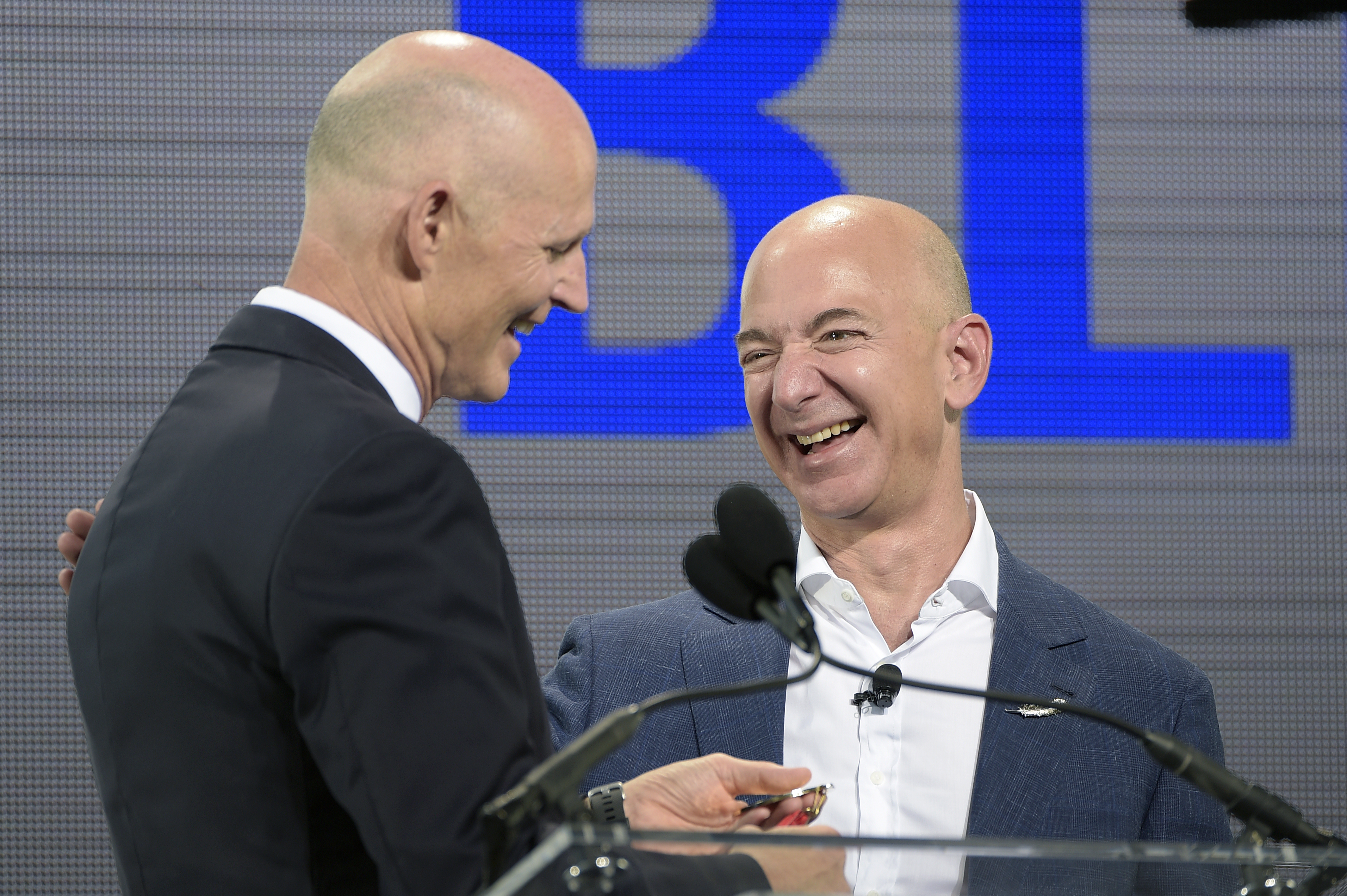 Jeff Bezos, Rick Scott