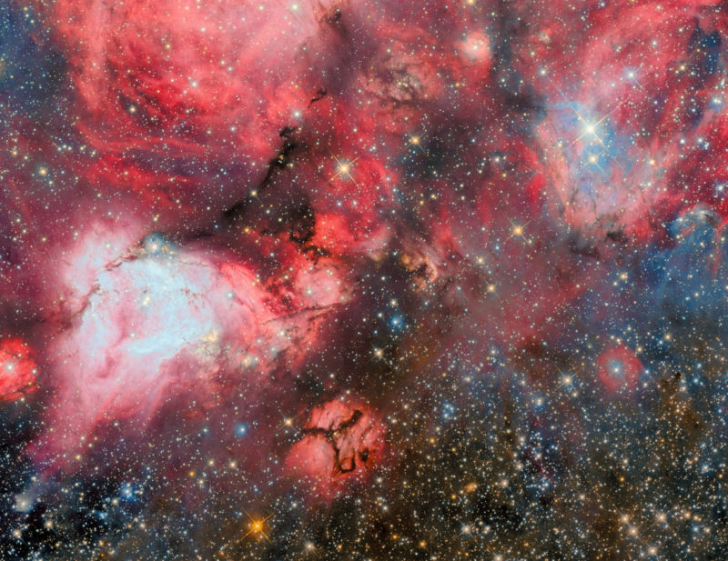 哈伯新影像揭示巨大恆星形成區細節，年輕恆星在黑暗中閃耀炫目光芒